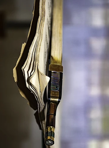 limpiar cerdas del arco del violin